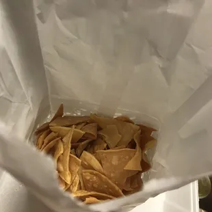 A scoop of chips that I did not order but I did pay for it anyways. Smh