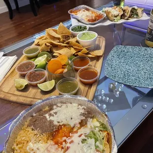 Enchilada and taco combo, Chile rellano. Chicken and steak taco, and chips and all salsas