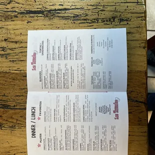 a menu on a wooden table