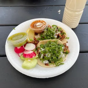 Delicous Al pastor tacos! And don&apos;t forget your horchata!