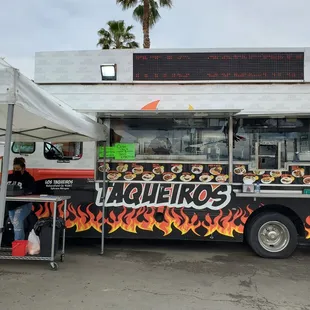 a food truck parked in a parking lot