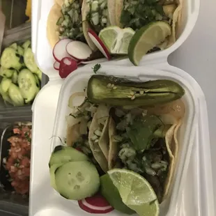 two trays of tacos