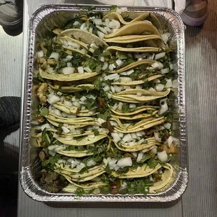 al pastor, beef, pollo, and tripe tacos