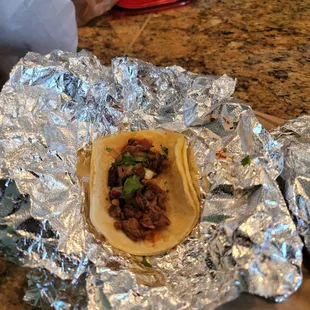 This small taco for $3.75 and no salsa. Apparently you have to s we ve yourself salsa on the side. Even for pick up delivery orders.