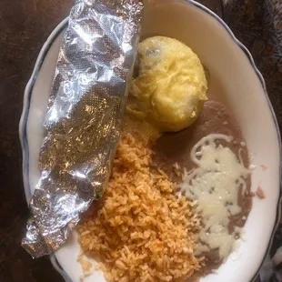 Combo soft taco, chili relleno, rice and beans.