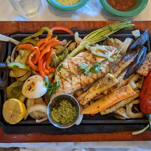 Grilled redfish. Comes with rice, beans, pico de Gallo, guac, and tortillas.