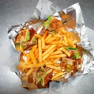 Club sandwich with fries. Doesn't it look delicious?