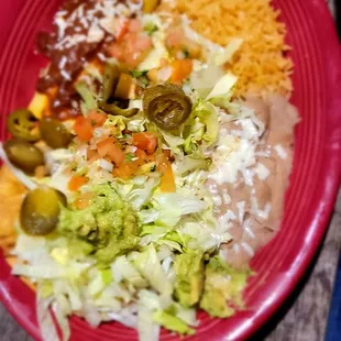 Cheese enchiladas and taco plate