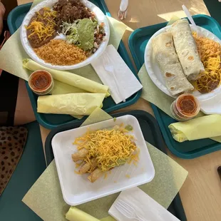 three plates of food on a table