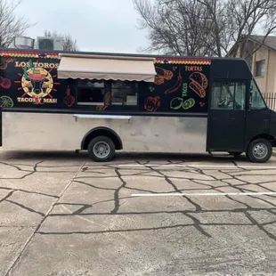 a food truck parked in a parking lot