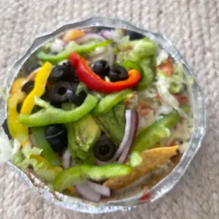 1/2 Botana delicious..steak.. chicken.. blk olives.. red onions..yellow &amp; Green peppers avocado..lettuce.. refried beans..cheese..salsa