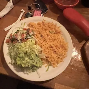 Rice , beans , salad, Guacamole