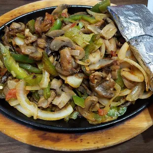 Mushroom fajitas sans cheese sauce.