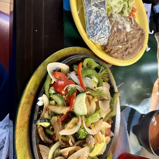 Veggie fajitas with beans, veggie guacamole &amp; tortillas