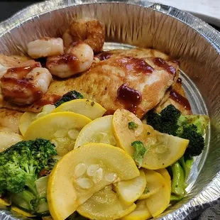 Chicken, shrimp, squash, and broccoli.  Yummy