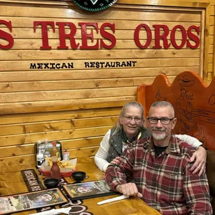 two people sitting at a table