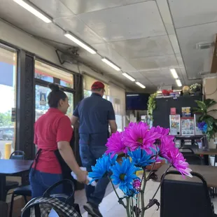 Fresh flowers on all the tables. Suck a quaint, nice touch.