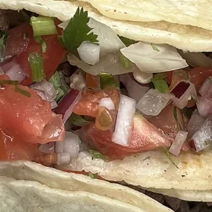 My asada tacos, I added pico de gallo to it, the pico de gallo es an extra charge.