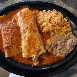 Cheese enchilada, pork burrito with rice and beans