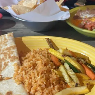 Lunch portion of cheese quesadilla with rice and grilled veggies (YUM) !