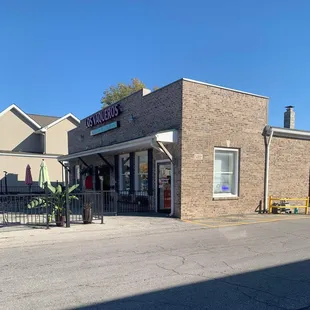 Front entrance. They have some tables so that you can eat outside.
