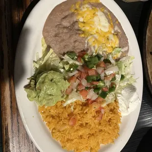 Rice and beans with sides for fajitas