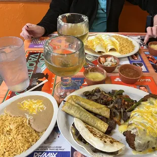Johns special front, and chicken enchiladas with sour cream sauce back.
