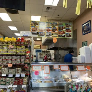 The kitchen inside a convenient store/deli