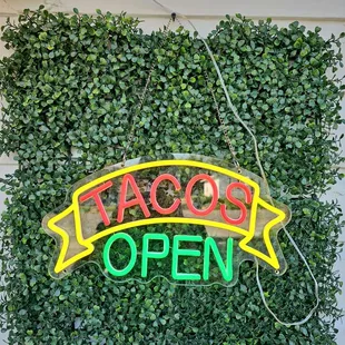 Tacos open sign