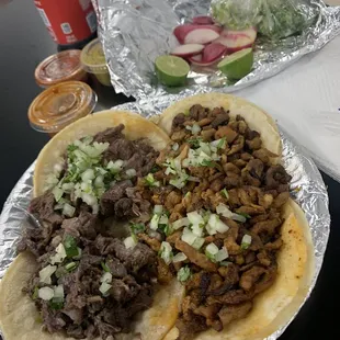 Cabeza tacos on left and Al pastor on right