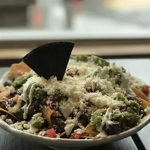 a bowl of mexican food