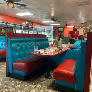 Acrylic barrier between tables