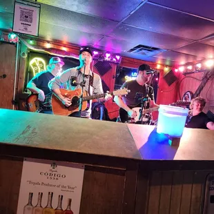 a band playing on stage