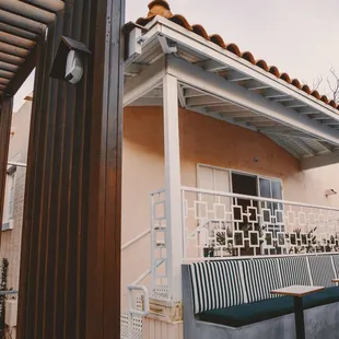 a view of a balcony and a building