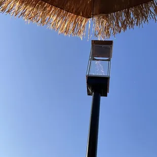 gas lamp beacons and tiki umbrella
