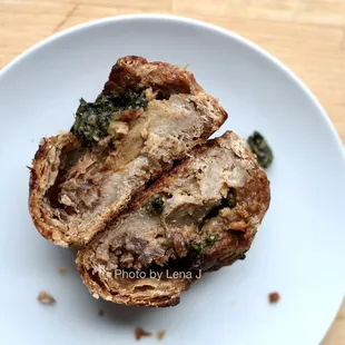 Inside of Smoked Malt Potato Knish ($3.50) - potato and caramelized onion filling, walnut and basil pesto on top