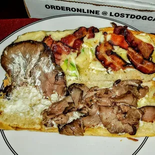 18. President: Lean roast beef, melted brie, crispy bacon, avocado, and mayo served on a toasted sub roll. $10.95