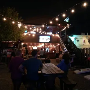 I almost made a mistake staying in the front bar. The backyard patio rocks! Ping-pong, bags, football on TV. Rocks I tell ya!