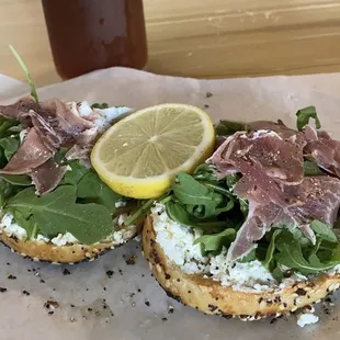 Everything bagel with cream cheese, arugula, and prosciutto.