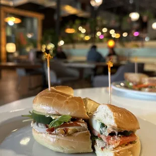 a sandwich cut in half on a plate