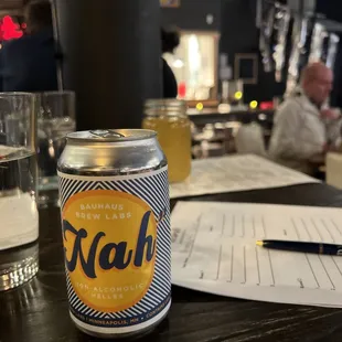 a can of beer on a table
