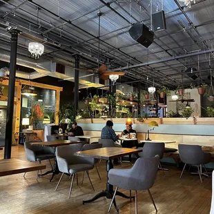 a restaurant with tables and chairs