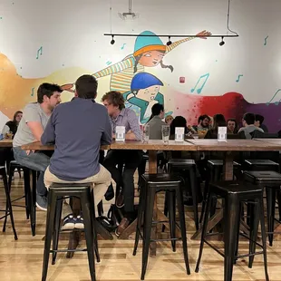 a group of people sitting at a table