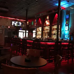 a bar with red and blue lights
