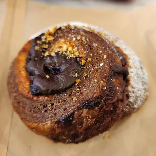 a pastry with chocolate and sprinkles