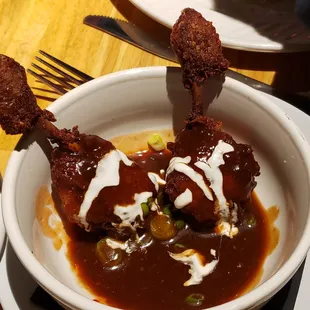 a bowl of food with a fork in it