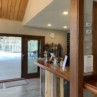 a bar with wine glasses on it