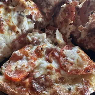 This was the individual sized Lucille pizza. It has grilled chicken, bacon, roasted garlic, tomatoes and a ranch drizzle.