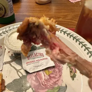 One of the bloody chicken wings