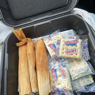 Horrible 3 Delta Hot Tamales. They are dry, stiff and served cold .